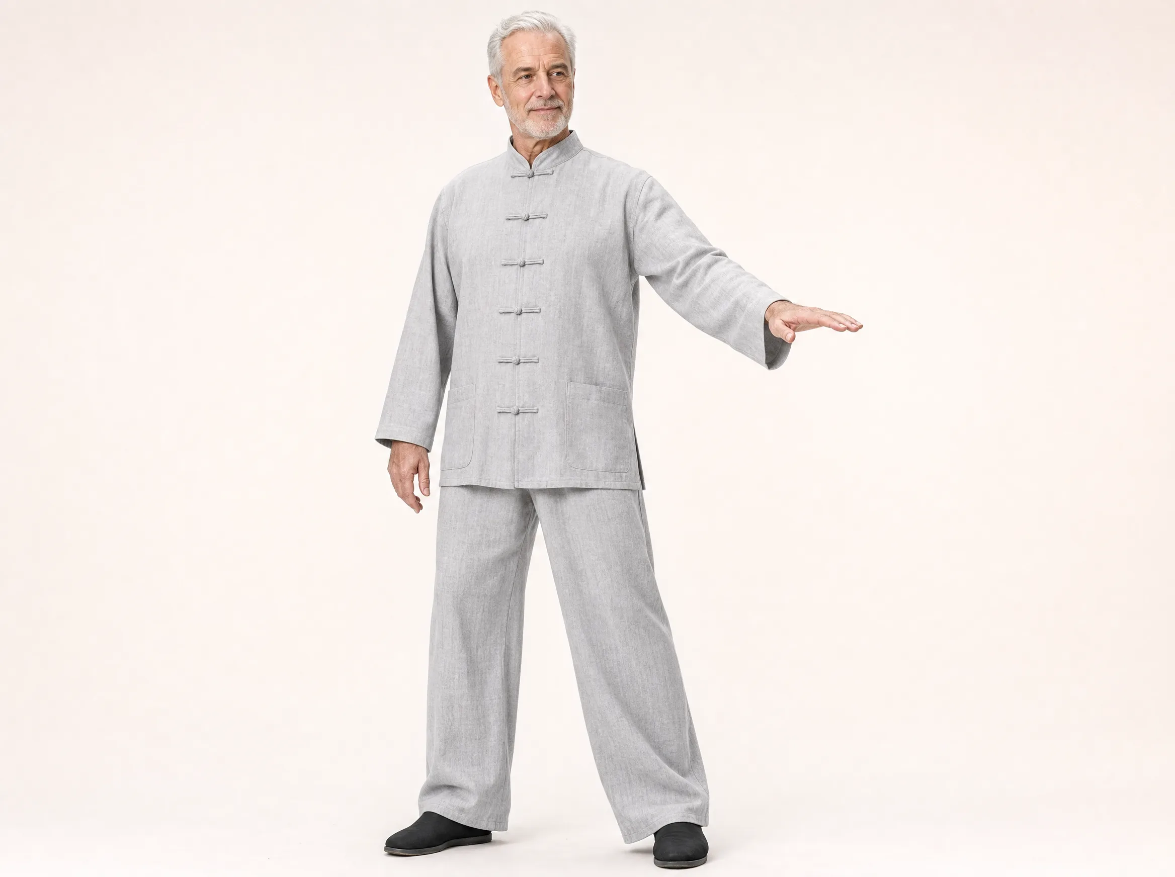 Older Western man wearing a light gray long-sleeve cotton-linen tai chi uniform