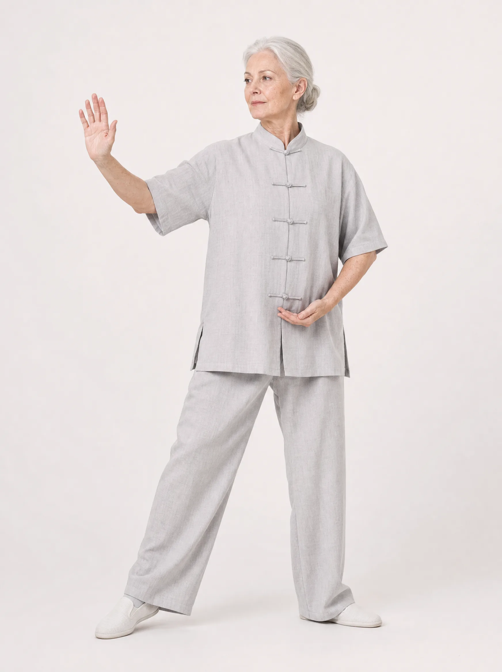 Older Western adult wearing a short-sleeve cotton-linen tai chi uniform